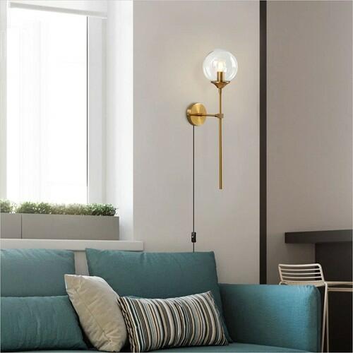 BOKT Gold Globe Wall Sconce Plug In Brass Glass Mid Century Light Clear